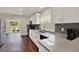Modern kitchen with stainless steel appliances and white cabinetry at 2107 W Carmen St, Tampa, FL 33606