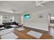 Spacious living room area with a table and hardwood flooring at 2107 W Carmen St, Tampa, FL 33606