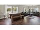 Spacious living room with a large window and dark wood flooring throughout the home at 2107 W Carmen St, Tampa, FL 33606