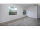 Bedroom with tile flooring, two windows facing to the backyard at 2443 2Nd S Ave, St Petersburg, FL 33712