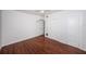 Spacious bedroom featuring hardwood floors, two windows facing the backyard at 2443 2Nd S Ave, St Petersburg, FL 33712