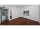 Bright bedroom with hardwood floors, natural light, and ample closet space at 2443 2Nd S Ave, St Petersburg, FL 33712