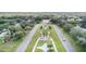 Aerial view of a meticulously landscaped community with lush greenery and elegant architecture at 2468 Florentine Way # 26, Clearwater, FL 33763