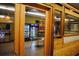 Image looking into the community cafe through a doorway surrounded by wood trim at 2468 Florentine Way # 26, Clearwater, FL 33763