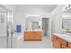 Spacious bathroom with double vanity, garden tub, and glass shower at 25332 Lexington Oaks Blvd, Wesley Chapel, FL 33544
