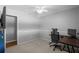 Bedroom with a ceiling fan, carpet floors, and a view of the entrance at 25332 Lexington Oaks Blvd, Wesley Chapel, FL 33544