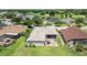 Aerial view of the property showcasing the backyard, deck, and community at 25942 Risen Star Dr, Wesley Chapel, FL 33544