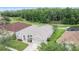 Aerial shot of the house showing its well-manicured front yard at 25942 Risen Star Dr, Wesley Chapel, FL 33544