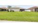 Expansive backyard with a deck, perfect for outdoor entertaining at 25942 Risen Star Dr, Wesley Chapel, FL 33544