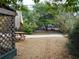 Serene backyard area with picnic table and mulch ground cover at 2624 54Th S St, Gulfport, FL 33707