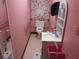 Bathroom with grab bars, colorful butterfly curtain, and vanity at 2624 54Th S St, Gulfport, FL 33707