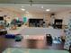 Inviting interior featuring neutral walls, carpet, commercial lighting, and functional learning spaces at 2624 54Th S St, Gulfport, FL 33707