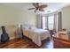 Bedroom boasts a ceiling fan and bay window with an area for a desk at 2739 Via Capri # 1011, Clearwater, FL 33764