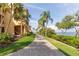 Beautiful yellow condominiums overlooking a pathway and waterfront at 2739 Via Capri # 1011, Clearwater, FL 33764