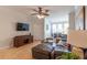 Comfortable living room with tile flooring, dining area and modern decor at 2739 Via Capri # 1011, Clearwater, FL 33764