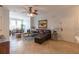 Bright living room featuring tile floors, modern furniture and dining area at 2739 Via Capri # 1011, Clearwater, FL 33764