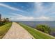 Scenic waterfront path with bench and beautiful waterfront view at 2739 Via Capri # 1011, Clearwater, FL 33764