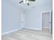 A spacious bedroom with light wood floors and recessed ceiling lights at 3004 W Abdella St, Tampa, FL 33607