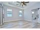 The main bedroom boasts a tray ceiling, recessed lights, and private bath at 3004 W Abdella St, Tampa, FL 33607