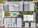 Stunning aerial view of the community featuring a refreshing pool and lush landscaping at 301 2Nd N St # 15, St Petersburg, FL 33701