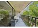 Outdoor balcony featuring verdant landscaping and a lounge at 301 2Nd N St # 15, St Petersburg, FL 33701