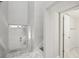 Bright foyer with soaring ceilings, marble floors, and access to a half bathroom and staircase at 301 2Nd N St # 15, St Petersburg, FL 33701