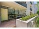 Cozy outdoor patio space with grill and verdant landscaping at 301 2Nd N St # 15, St Petersburg, FL 33701