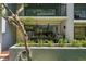 Cozy ground floor patio with outdoor seating and grill at 301 2Nd N St # 15, St Petersburg, FL 33701