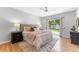 Spacious main bedroom with a sliding glass door and lots of natural light at 3125 W Fielder St, Tampa, FL 33611
