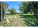 Expansive backyard with mature trees, storage shed, and plenty of room to roam at 3305 Blythe Ave, Spring Hill, FL 34609