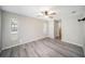 Bedroom featuring a ceiling fan and closet at 3305 Blythe Ave, Spring Hill, FL 34609