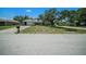 Charming single-story home featuring a well-kept lawn and inviting front entrance at 3305 Blythe Ave, Spring Hill, FL 34609
