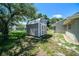Backyard shed for extra storage on a well-maintained property at 3305 Blythe Ave, Spring Hill, FL 34609