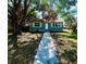 Charming single-story home with a well-kept front yard and a welcoming walkway at 4214 Fairfield S Ave, St Petersburg, FL 33711