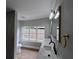 Updated bathroom featuring dual sinks, modern lighting, and an updated shower and tile surround at 4434 Bass St, Tampa, FL 33617