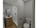 Bathroom featuring a new shower with modern fixtures and vanity at 4434 Bass St, Tampa, FL 33617