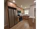 Modern kitchen featuring stainless steel appliances, stylish cabinets, and new countertops at 4434 Bass St, Tampa, FL 33617