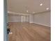 Spacious living room featuring hardwood floors and recessed lighting at 4434 Bass St, Tampa, FL 33617