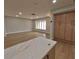 Bright living room with wood flooring, recessed lighting, and a view of the expansive space at 4434 Bass St, Tampa, FL 33617