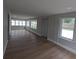 Light-filled sunroom with multiple windows and neutral paint at 4434 Bass St, Tampa, FL 33617