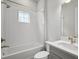 Clean bathroom features a shower and tub combination, vanity sink with modern fixtures at 4523 Foley Grove Dr, Valrico, FL 33596