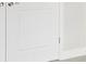 Neutral bedroom features doors and carpeted floor at 4523 Foley Grove Dr, Valrico, FL 33596