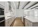Modern kitchen with stainless steel appliances and a large kitchen island with a sink at 4523 Foley Grove Dr, Valrico, FL 33596