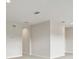 Minimalist-styled room with neutral walls and recessed lighting at 4523 Foley Grove Dr, Valrico, FL 33596