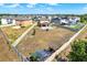 Expansive fenced backyard with a covered patio perfect for outdoor entertaining and relaxation at 5067 Sable Chime Dr, Wimauma, FL 33598