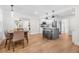 Modern kitchen featuring stainless steel appliances, a center island, and light wood floors at 526 62Nd Ne Ave, St Petersburg, FL 33702