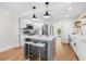 Modern, updated kitchen with an island, stainless appliances, and bright, airy atmosphere at 526 62Nd Ne Ave, St Petersburg, FL 33702