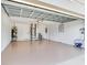 An empty, painted, and clean residential garage at 5470 Bayshore Dr, Seminole, FL 33772
