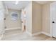 Pantry with shelving, complemented by views into the entry and adjacent bathroom at 5470 Bayshore Dr, Seminole, FL 33772