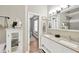 Bathroom with a double vanity, granite countertop, modern finishes, and an open floorplan at 5825 Terncrest Dr, Lithia, FL 33547